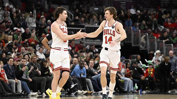 Mar 16, 2026; Chicago, Illinois, USA; Chicago Bulls guard Josh Giddey (3) and  forward Matas Buzelis (14) high five during the second half at United Center. Mandatory Credit: Matt Marton-Imagn Images