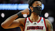 Mar 20, 2025; Lexington, KY, USA; Louisville Cardinals forward James Scott (0) reacts during the first half against the Creighton Bluejays in the first round of the NCAA Tournament at Rupp Arena. Mandatory Credit: Aaron Doster-Imagn Images