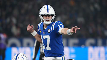 Nov 9, 2025; Berlin, Germany; Indianapolis Colts quarterback Daniel Jones (17) gestures before a snap against the Atlanta Falcons during the NFL Berlin Game at Olympic Stadium. Mandatory Credit: Kirby Lee-Imagn Images