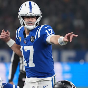 Nov 9, 2025; Berlin, Germany; Indianapolis Colts quarterback Daniel Jones (17) gestures before a snap against the Atlanta Falcons during the NFL Berlin Game at Olympic Stadium. Mandatory Credit: Kirby Lee-Imagn Images