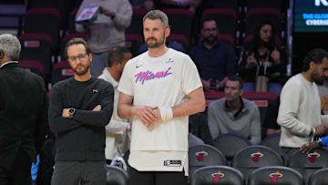 Jan 29, 2025; Miami, Florida, USA;  Miami Heat forward Kevin Love (42) looks on during warm-ups before the game against the Cleveland Cavaliers at Kaseya Center. Mandatory Credit: Jim Rassol-Imagn Images