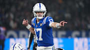 Nov 9, 2025; Berlin, Germany; Indianapolis Colts quarterback Daniel Jones (17) gestures before a snap against the Atlanta Falcons during the NFL Berlin Game at Olympic Stadium. 