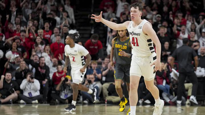 Feb 25, 2025; Cincinnati, Ohio, USA;  Cincinnati Bearcats guard Simas Lukosius (41) reacts to making a three-point shot against the Baylor Bears in the second half at Fifth Third Arena. Mandatory Credit: Aaron Doster-Imagn Images