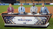 Oct 26, 2024; Los Angeles, California, USA;  Left to right: Fox Sports broadcasters Kevin Burkhardt and Alex Rodriguez and David Ortiz and Derek Jeter on field after the game two between the Los Angeles Dodgers and the New York Yankees of the 2024 MLB World Series at Dodger Stadium. 