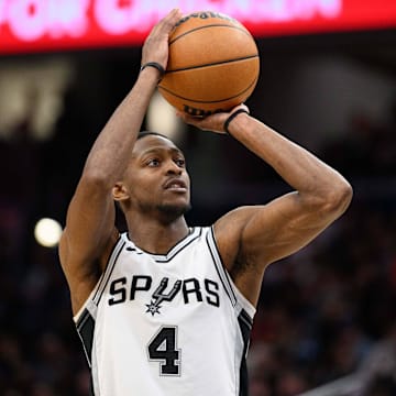 Feb 10, 2025; Washington, District of Columbia, USA; San Antonio Spurs guard De'Aaron Fox (4) shoots a free throw during the fourth quarter against the Washington Wizards at Capital One Arena.