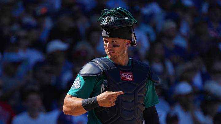 Mar 12, 2026; Mesa, Arizona, USA; Seattle Mariners catcher Andrew Knizner (25) calls out the play against the Chicago Cubs in the third inning at Sloan Park. Mandatory Credit: Rick Scuteri-Imagn Images