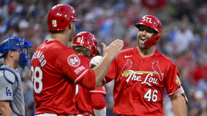 Aug 16, 2024; St. Louis, Missouri, USA;  St. Louis Cardinals first baseman Paul Goldschmidt (46) celebrates with third baseman Nolan Arenado (28) after hitting a two run home run against the Los Angeles Dodgers during the second inning at Busch Stadium. Mandatory Credit: Jeff Curry-USA TODAY Sports