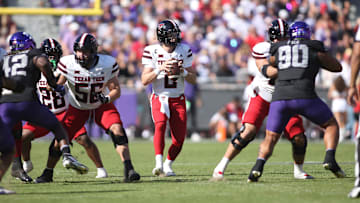 Oct 26, 2024; Fort Worth, Texas, USA; Texas Tech Red Raiders quarterback Behren Morton (2) throws a pass against the TCU Horned Frogs in the first quarter  at Amon G. Carter Stadium. Mandatory Credit: Tim Heitman-Imagn Images