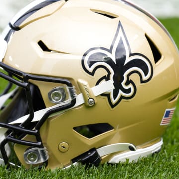 Sep 24, 2023; Green Bay, Wisconsin, USA;  An New Orleans Saints helmet during warmups prior to the game against the Green Bay Packers at Lambeau Field. Mandatory Credit: Jeff Hanisch-USA TODAY Sports