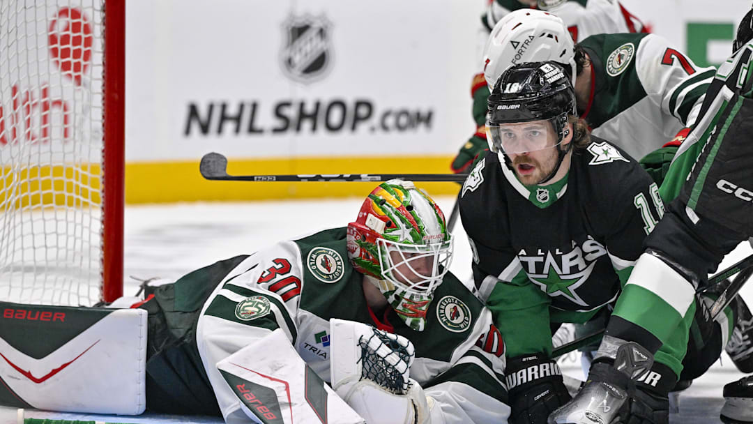 Apr 28, 2026; Dallas, Texas, USA; Minnesota Wild goaltender Jesper Wallstedt (30) covers up the puck in front of Dallas Stars center Sam Steel (18) during the second period in game five of the first round of the 2026 Stanley Cup Playoffs at American Airlines Center. Mandatory Credit: Jerome Miron-Imagn Images