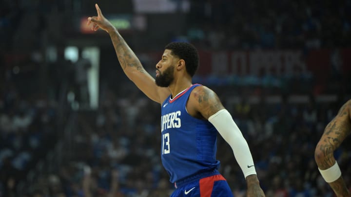 Apr 21, 2024; Los Angeles, California, USA;  Los Angeles Clippers forward Paul George (13) heads down court after a 3-point basket in the first quarter of game one of the first round for the 2024 NBA playoffs against the Los Angeles Clippers at Crypto.com Arena. Mandatory Credit: Jayne Kamin-Oncea-USA TODAY Sports