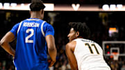 Jan 25, 2025; Nashville, Tennessee, USA;  Vanderbilt Commodores guard AJ Hoggard (11) talks a little trash to Kentucky Wildcats guard Jaxson Robinson (2) at the end of the game during the second half at Memorial Gymnasium. Mandatory Credit: Steve Roberts-Imagn Images