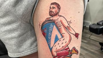 Travis Kelce pin-up tattoo