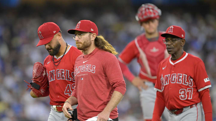 Jun 21, 2024; Los Angeles, California, USA;  Los Angeles Angels starting pitcher Patrick Sandoval (43) leaves the game after an injury during the third inning against the Los Angeles Dodgers at Dodger Stadium. Mandatory Credit: Jayne Kamin-Oncea-USA TODAY Sports