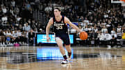Mar 1, 2025; Providence, Rhode Island, USA; Connecticut Huskies forward Liam McNeeley (30) dribbles against the Providence Friars  during the second half at Amica Mutual Pavilion. Mandatory Credit: Eric Canha-Imagn Images