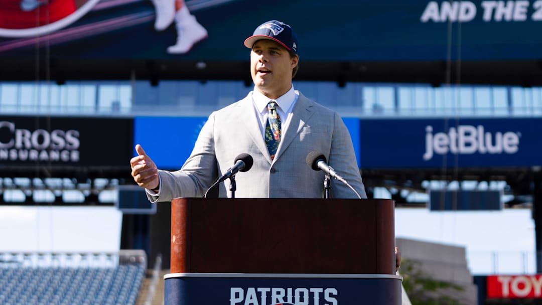 May 7, 2026; Foxborough, MA, USA; New England Patriots first round draft pick Caleb Lomu addresses the media during a press conference on the game field at Gillette Stadium. Mandatory Credit: Natalie Reid-Imagn Images