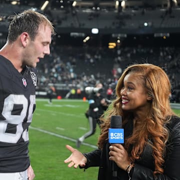 Dec 22, 2024; Paradise, Nevada, USA; CBS Sports sideine reporter AJ Ross interviews Las Vegas Raiders tight end Brock Bowers (89) and guard Jackson Powers-Johnson (58) after the game against the Jacksonville Jaguars Allegiant Stadium. Mandatory Credit: Kirby Lee-Imagn Images