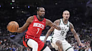 Nov 9, 2025; Milwaukee, Wisconsin, USA; Houston Rockets forward Kevin Durant (7) drives against Milwaukee Bucks forward Kyle Kuzma (18) in the first half at Fiserv Forum. Mandatory Credit: Michael McLoone-Imagn Images