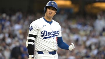 Jul 22, 2024; Los Angeles, California, USA;  Los Angeles Dodgers designated hitter Shohei Ohtani (17) reacts after fouling off a pitch in the third inning against the San Francisco Giants at Dodger Stadium. 