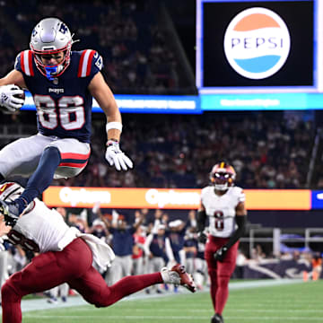 Aug 8, 2025; Foxborough, Massachusetts, USA; New England Patriots wide receiver Efton Chism III (86) scores a touchdown against the Washington Commanders during the second half at Gillette Stadium. Mandatory Credit: Brian Fluharty-Imagn Images