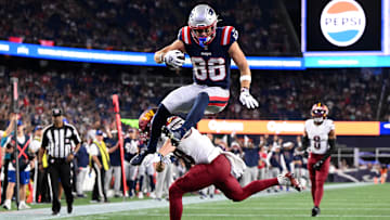 Aug 8, 2025; Foxborough, Massachusetts, USA; New England Patriots wide receiver Efton Chism III (86) scores a touchdown against the Washington Commanders during the second half at Gillette Stadium. Mandatory Credit: Brian Fluharty-Imagn Images