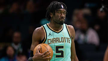 Jan 24, 2025; Charlotte, North Carolina, USA; Charlotte Hornets center Mark Williams (5) holds the ball against the Portland Trail Blazers during the second quarter at Spectrum Center. Mandatory Credit: Scott Kinser-Imagn Images