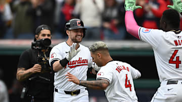 Oct 12, 2024; Cleveland, Ohio, USA; Cleveland Guardians outfielder Lane Thomas (8) celebrates with shortstop Brayan Rocchio (4) in the fifth inning against the Detroit Tigers during game five of the ALDS for the 2024 MLB Playoffs at Progressive Field. Mandatory Credit: Ken Blaze-Imagn Images
