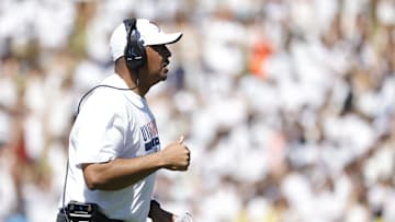 Sep 13, 2025; Charlottesville, Virginia, USA; Virginia Cavaliers head coach Tony Elliott looks on from the field in a stoppage in play against the William & Mary Tribe during the second quarter at Scott Stadium. Mandatory Credit: Amber Searls-Imagn Images