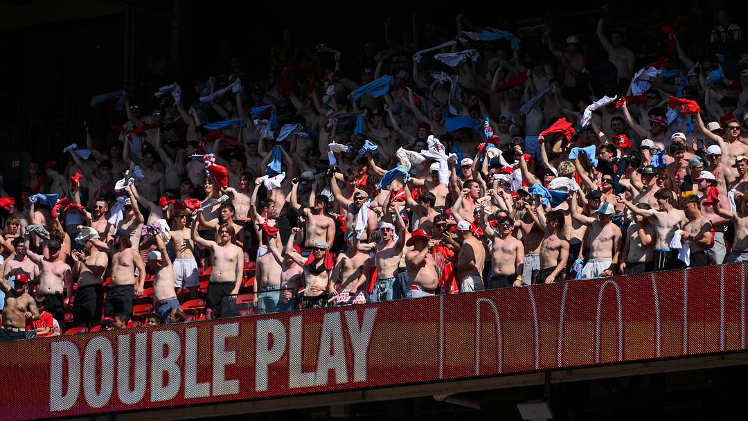 May 17, 2026; St. Louis, Missouri, USA; A group of shirtless fans react after a the St. Louis Cardinals completed a double play against the Kansas City Royals during the ninth inning at Busch Stadium. Mandatory Credit: Jeff Curry-Imagn Images