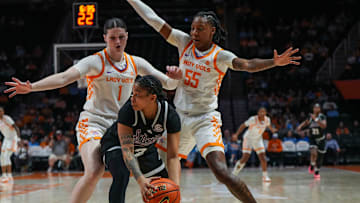Tennessee forward Sarah Puckett (1) and Tennessee guard Talaysia Cooper (55) box-in Mississippi guard Jerkaila Jordan (2) during a women's college basketball game between the Lady Vols and Mississippi State at Thompson-Boling Arena at Food City Center on Thursday, Jan. 16, 2025.