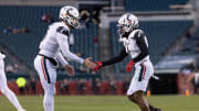 Nov 19, 2022; Philadelphia, Pennsylvania, USA; Cincinnati Bearcats quarterback Ben Bryant (6) and wide receiver Tre Tucker (1) celebrate a touchdown connection against the Temple Owls during the first quarter at Lincoln Financial Field. Mandatory Credit: Bill Streicher-USA TODAY Sports