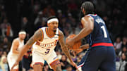 Jan 27, 2025; Phoenix, Arizona, USA; Phoenix Suns guard Bradley Beal (3) guards LA Clippers guard James Harden (1) during the second half at Footprint Center. Mandatory Credit: Joe Camporeale-Imagn Images