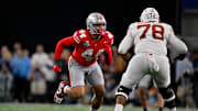 Jan 10, 2025; Arlington, TX, USA; Ohio State Buckeyes defensive end JT Tuimoloau (44) and Texas Longhorns offensive lineman Kelvin Banks Jr. (78) in action during the game between the Texas Longhorns and the Ohio State Buckeyes at AT&T Stadium. Mandatory Credit: Jerome Miron-Imagn Images