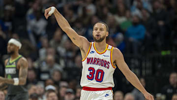 Jan 15, 2025; Minneapolis, Minnesota, USA; Golden State Warriors guard Stephen Curry (30) celebrates after making a three point shot against the Minnesota Timberwolves in the first half at Target Center. 