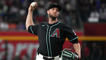 May 7, 2025; Phoenix, Arizona, USA; Arizona Diamondbacks pitcher Merrill Kelly (29) throws against the New York Mets in the first inning at Chase Field. Mandatory Credit: Rick Scuteri-Imagn Images