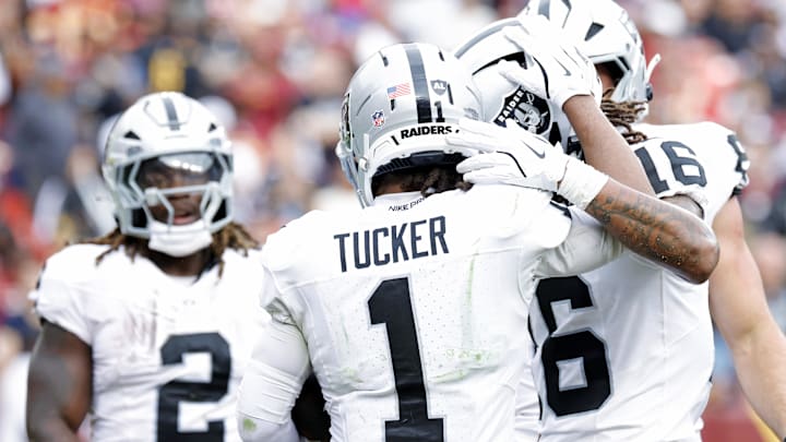 Sep 21, 2025; Landover, Maryland, USA; Las Vegas Raiders wide receiver Tre Tucker (1) celebrates after scoring a touchdown during the second half against the Washington Commanders at Northwest Stadium. Mandatory Credit: Amber Searls-Imagn Images