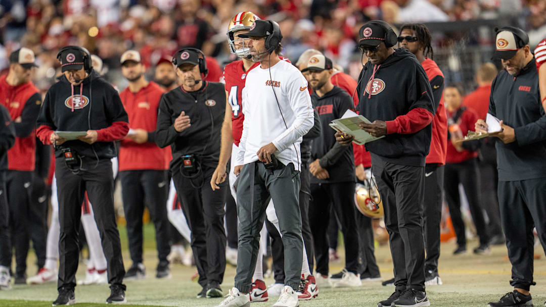 Oct 27, 2024; Santa Clara, California, USA; San Francisco 49ers head coach Kyle Shanahan looks on after the first down by the Dallas Cowboys during the third quarter at Levi's Stadium. Mandatory Credit: Neville E. Guard-Imagn Images