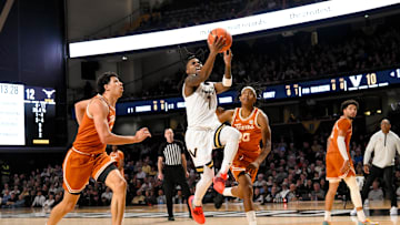 Feb 8, 2025; Nashville, Tennessee, USA; Vanderbilt Commodores guard Jason Edwards (1) lays the ball in against the Texas Longhorns during the first half at Memorial Gymnasium. Mandatory Credit: Steve Roberts-Imagn Images