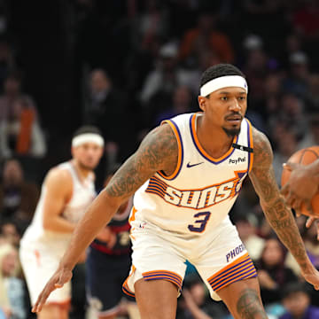 Jan 27, 2025; Phoenix, Arizona, USA; Phoenix Suns guard Bradley Beal (3) guards LA Clippers guard James Harden (1) during the second half at Footprint Center.