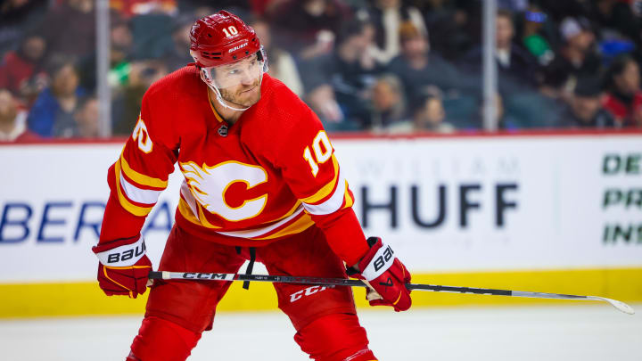 Mar 24, 2024; Calgary, Alberta, CAN; Calgary Flames center Jonathan Huberdeau (10) against the Buffalo Sabres during the second period at Scotiabank Saddledome. Mandatory Credit: Sergei Belski-USA TODAY Sports