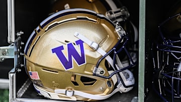 Oct 12, 2024; Iowa City, Iowa, USA;  A Washington Huskies helmet sits ready on the sidelines before the game against the Iowa Hawkeyes at Kinnick Stadium. Mandatory Credit: Jeffrey Becker-Imagn Images