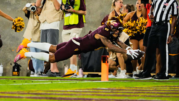 Arizona State Sun Devils wide receiver Jordyn Tyson (0) dives into the end zone in the second quarter of the game