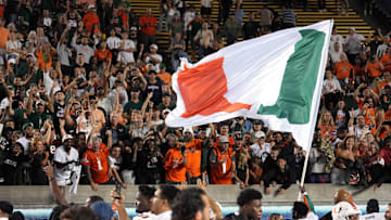 Oct 5, 2024; Berkeley, California, USA; Miami Hurricanes fans cheer with players after defeating the California Golden Bears at California Memorial Stadium. Mandatory Credit: Darren Yamashita-Imagn Images