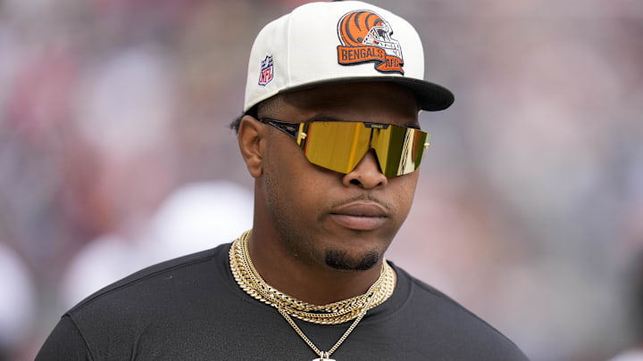 Aug 17, 2024; Chicago, Illinois, USA; Cincinnati Bengals offensive tackle Orlando Brown Jr. (75) walks the sideline during the first quarter of the NFL Preseason Week 2 game between the Chicago Bears and the Cincinnati Bengals at Soldier Field. Mandatory Credit: Sam Greene-Imagn Images