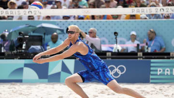 Aug 2, 2024; Paris, France; Chase Budinger (USA) sets in a match against Spain during the Paris 2024 Olympic Summer Games at Eiffel Tower Stadium.