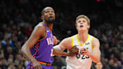 Jan 11, 2025; Phoenix, Arizona, USA; Utah Jazz forward Lauri Markkanen (23) and Phoenix Suns forward Kevin Durant (35) battle for position during the first half at Footprint Center. Mandatory Credit: Joe Camporeale-Imagn Images