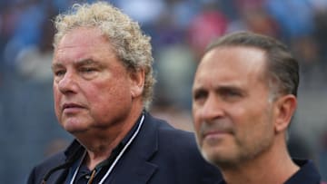 New York Yankees president Randy Levine looks on with AC Milan owner Gerry Cardinale in the foreground before the match between AC Milan and Manchester City at Yankee Stadium. 