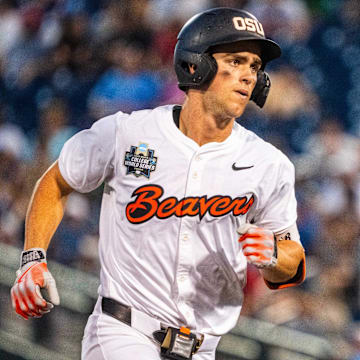 Jun 15, 2025; Omaha, Neb, USA; Oregon State Beavers left fielder Gavin Turley (1) rounds third after hitting a solo home run against the Coastal Carolina Chanticleers during the ninth inning at Charles Schwab Field. Mandatory Credit: Dylan Widger-Imagn Images