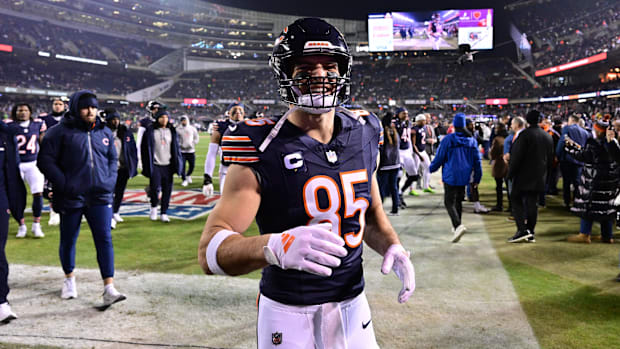 Chicago Bears tight end Cole Kmet (85) exits the field after warm ups