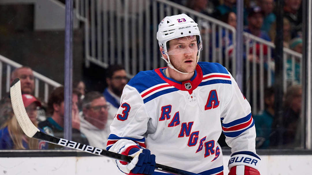 Mar 29, 2025; San Jose, California, USA; New York Rangers defenseman Adam Fox (23) skates against the San Jose Sharks during the second period at SAP Center at San Jose. Mandatory Credit: Robert Edwards-Imagn Images
